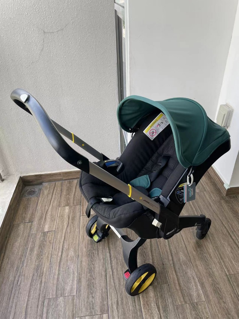 doona stroller green color, Babies & Kids, Going Out, Strollers on