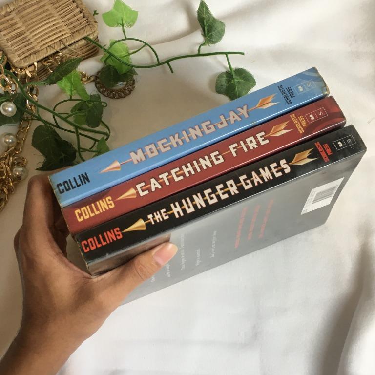 Hunger Games Book Set by Suzanne Collins (Preloved) (Category: Storybooks) located in Bulacan. Submitted by jxtr. (Listing ID 1133548499, Image 2). Description: Hunger Games Book Set by Suzanne Collins • Paperback • Good Quality • 100% Original These are preloved books so manage your expectations. If you have any more questions, don’t hesitate to message me. Thank you and have a good day! ❤.