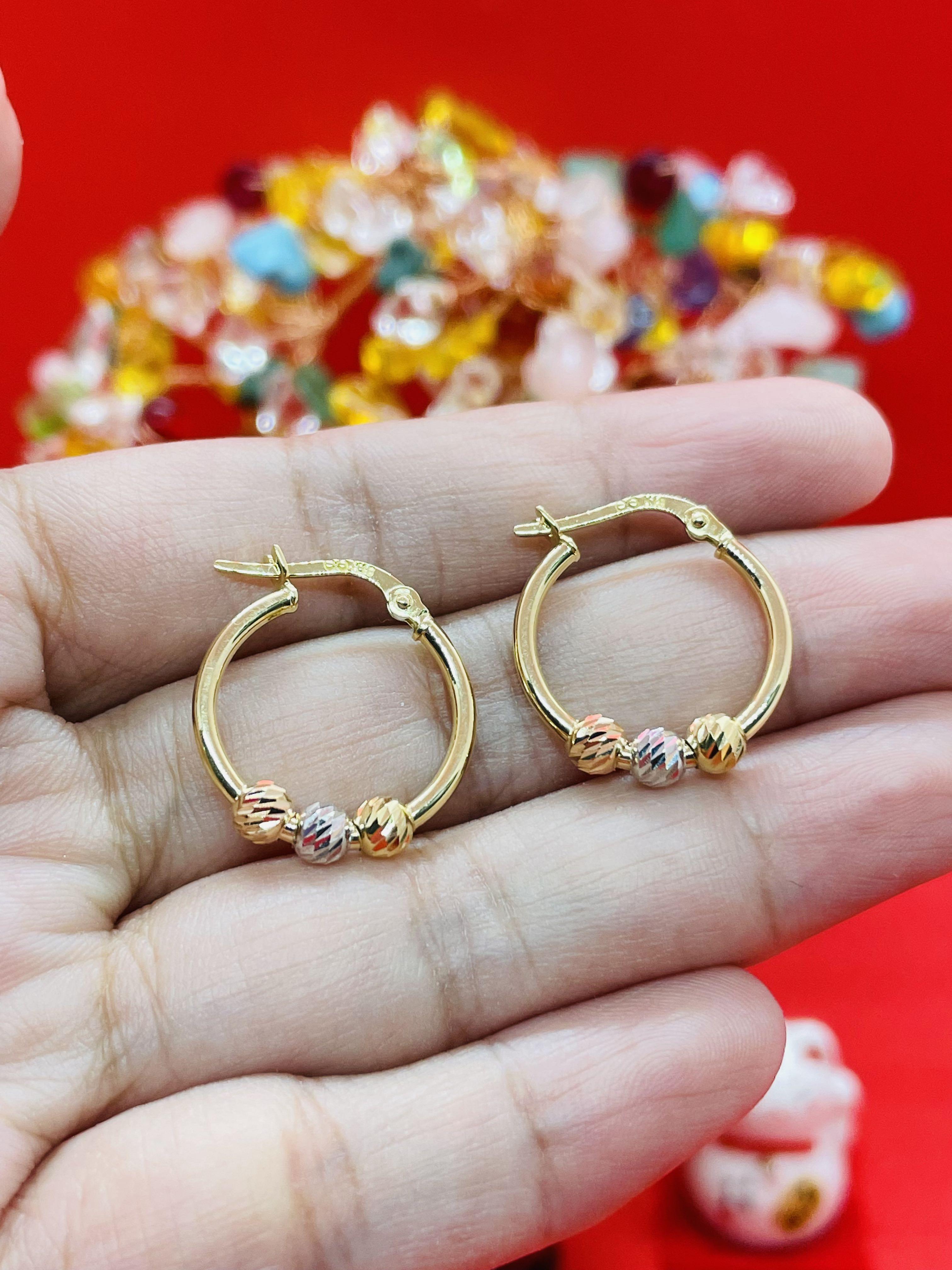 Three ball hotsell earrings
