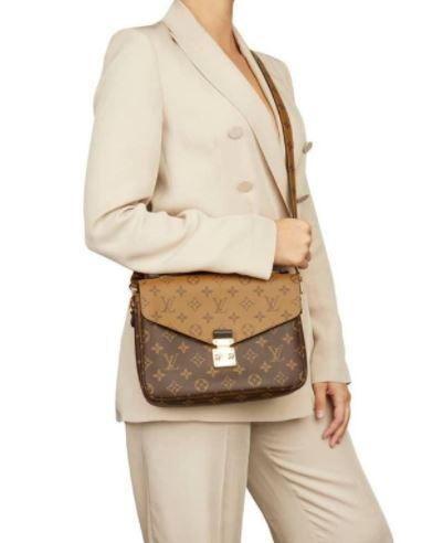 LV 40780 LV POCHETTE M TIS W BOX