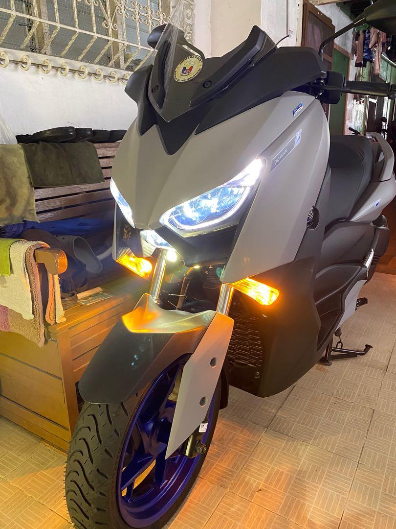 2021 yamaha xmax (Category: Motorbikes for Sale) located in Pasig City. Submitted by puppybotch (Listing ID 1133662848, Image 2). Description: For sale July 2021 yamaha xmax 7000 km only - legit No swap / sale only First owner seller under my name Newly registered january 2026 NCR mother file - OR CR With plate number Complete manual warranty booklet Brand new pirelli angel tires Front 120-70-15 Rear 150-70-14 mini driving lights bosch europa hor