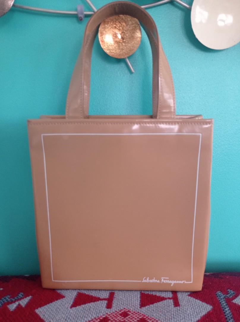 💯 Salvatore Ferragamo handbag (Category: Luxury Bags & Wallets) located in Taguig. Submitted by nanzmango (Listing ID 1133638539, Image 1). Description: 💯 Authentic Preloved Salvatorre Ferragamo Bag - light brown ✅ Patent Leather ✅good condition, very sturdy and very pretty in actual ✅bought in Japan Auction ✅flaws - minimal signs of usage, slight rubs but not visible. message me for more details Thank you and happy shopping 💖.
