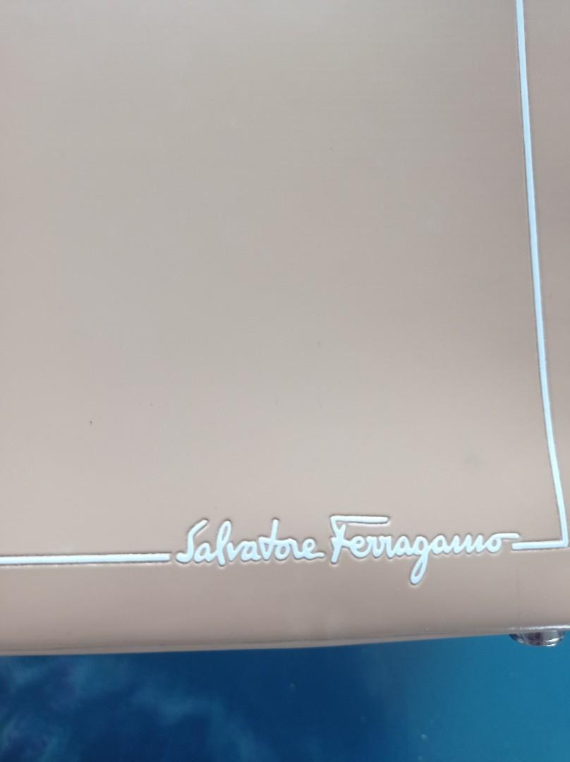 💯 Salvatore Ferragamo handbag (Category: Luxury Bags & Wallets) located in Taguig. Submitted by nanzmango (Listing ID 1133638539, Image 2). Description: 💯 Authentic Preloved Salvatorre Ferragamo Bag - light brown ✅ Patent Leather ✅good condition, very sturdy and very pretty in actual ✅bought in Japan Auction ✅flaws - minimal signs of usage, slight rubs but not visible. message me for more details Thank you and happy shopping 💖.