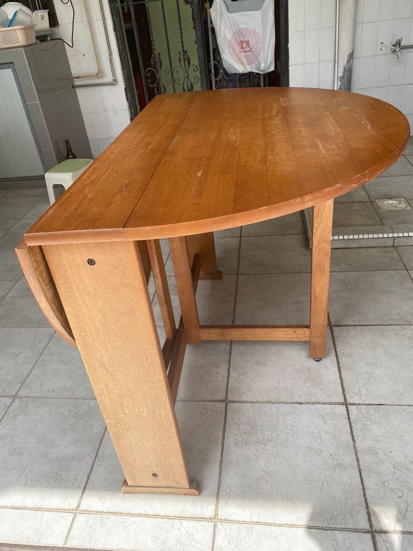 Folding oval dining sales table