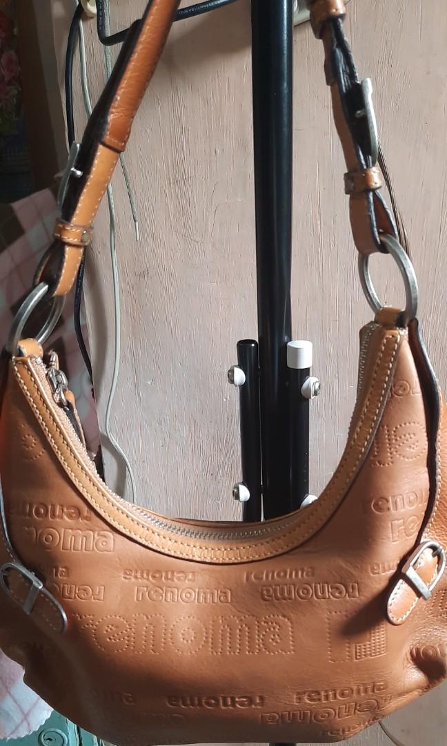 Renoma Paris baguette bag (Category: Shoulder Bags) located in Paranaque City. Submitted by bluedolphin1911 (Listing ID 1133807245, Image 2). Description: Preloved bag from Korea signs of use genuine leather ykk zip silver hardware excellent interior 5x12 inch.