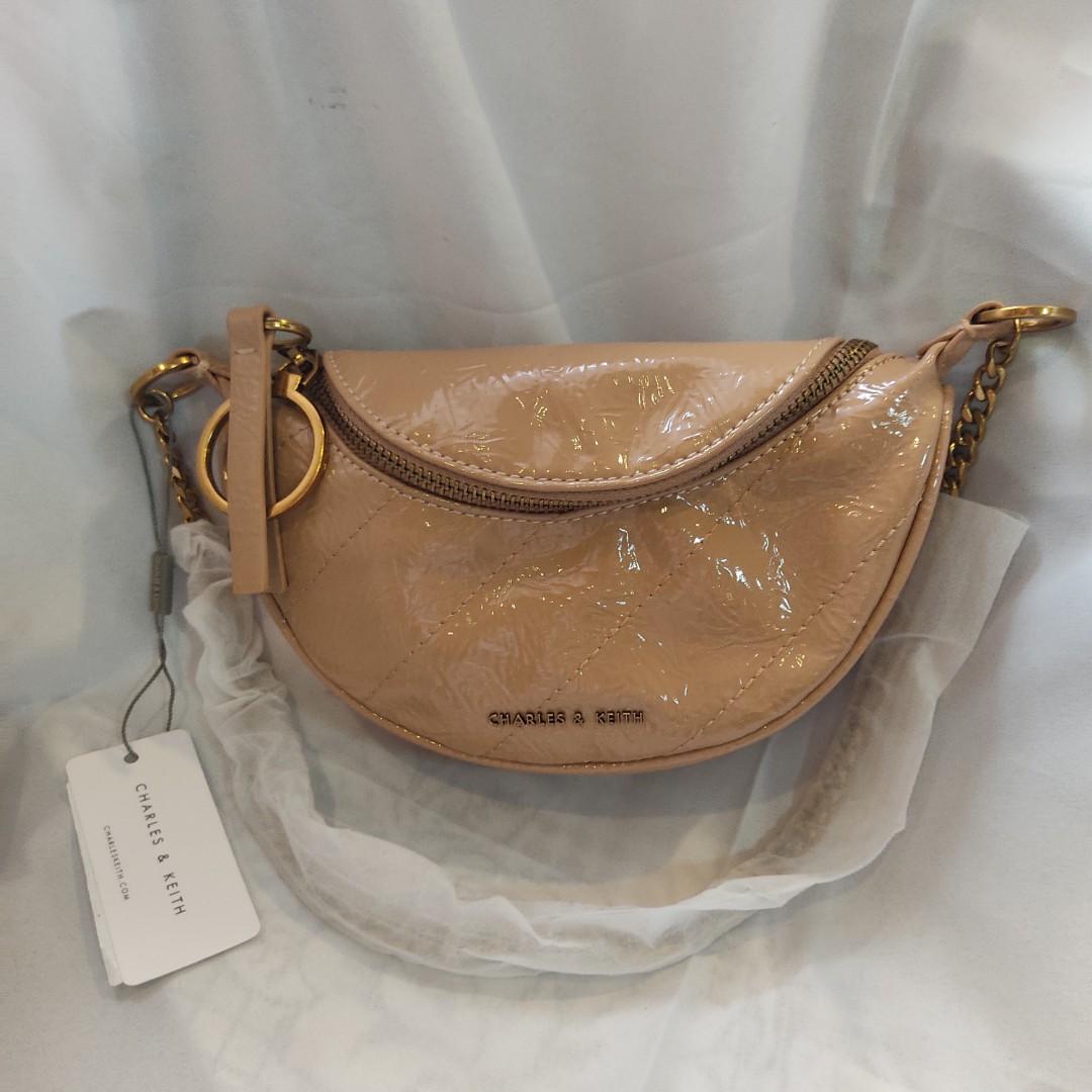 Wrinkled effect ring store zip tassel crossbody bag