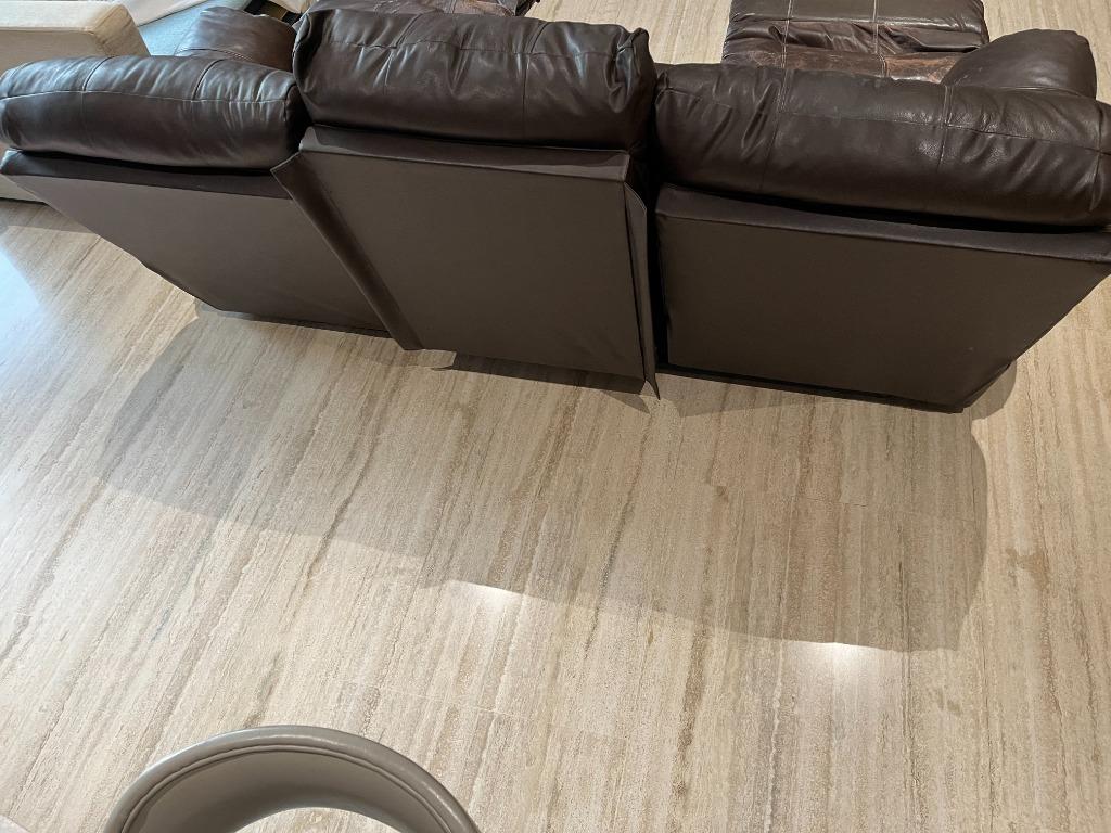 Heavily used reclining leather sofa for throw away price...reclining