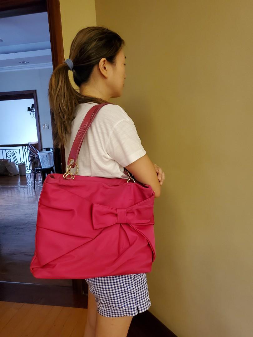 Kate Spade Pink Shoulder Bag (Category: Luxury Bags & Wallets) located in Pasig City. Submitted by kjochua (Listing ID 1134043881, Image 1). Description: original kate spade. slightly used, but stored. sf c/o buyer.