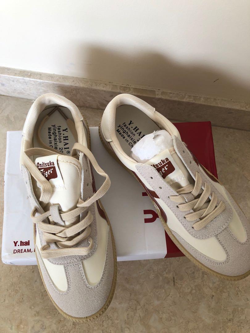 Onitsuka Tiger Inspired sneakers (Category: Sneakers) located in Singapore. Submitted by annlimcw (Listing ID 1128475990, Image 3). Description: Onitsuka Tiger INSPIRED sneakers - was sent wrong size by the China seller; hence, cannot fit into the shoe so need to sell - size 40; 250cm - overall quality is great, im letting go cos of wrong shoe size sent - however, please take note and take into consideration that the cutting of sneakers is on the