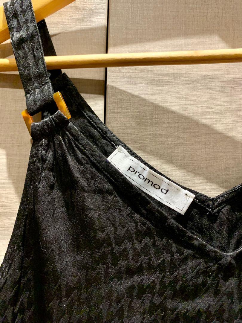 Promod black satin top (Category: Sleeveless) located in Mandaluyong City. Submitted by declutterila (Listing ID 1133973088, Image 2). Description: Black satin, v-neck sleeveless blouse with brown accents on the shoulder straps. Material is satin with geometric patterns, making it look so elegant. Tag says medium but will fit a size small or semi-medium best RFS: bought right before I got pregnant and didn’t find a chance to use it over the pande