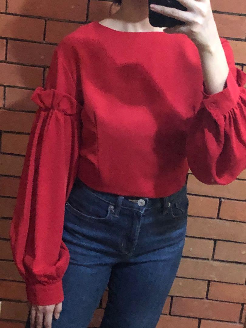 Red ruffle long sleeve (Category: Blouses) located in Quezon City. Submitted by lineuph (Listing ID 1134144477, Image 2). Description: Size small In very good condition Rfs: decluttering .
