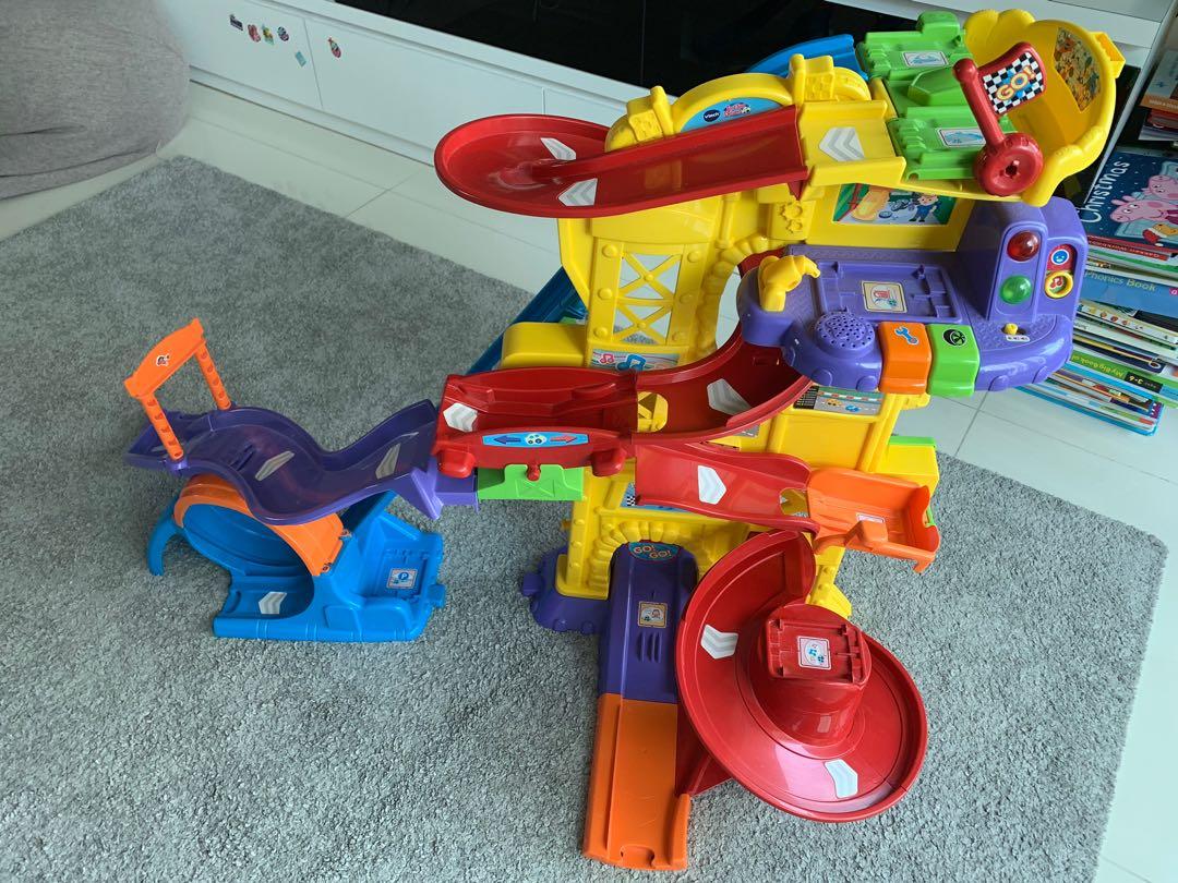 VTech racing tower + 9 vehicles, Hobbies & Toys, Toys & Games on Carousell