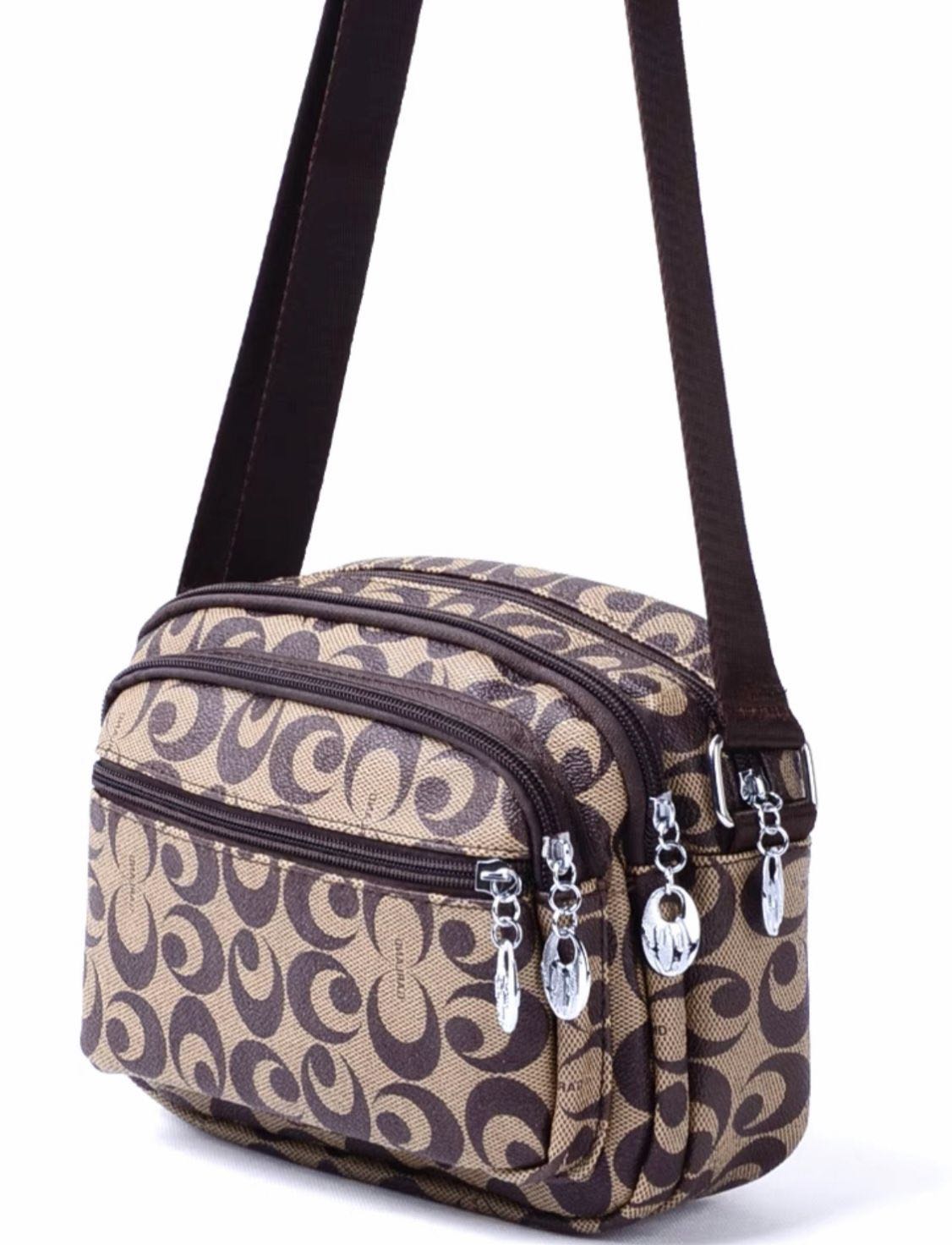 Multi compartment sling top bag