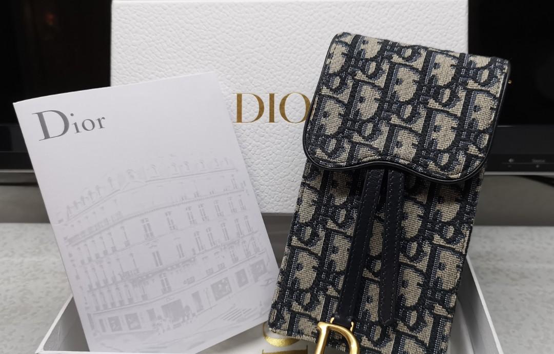 Dior vertical saddle outlet pouch