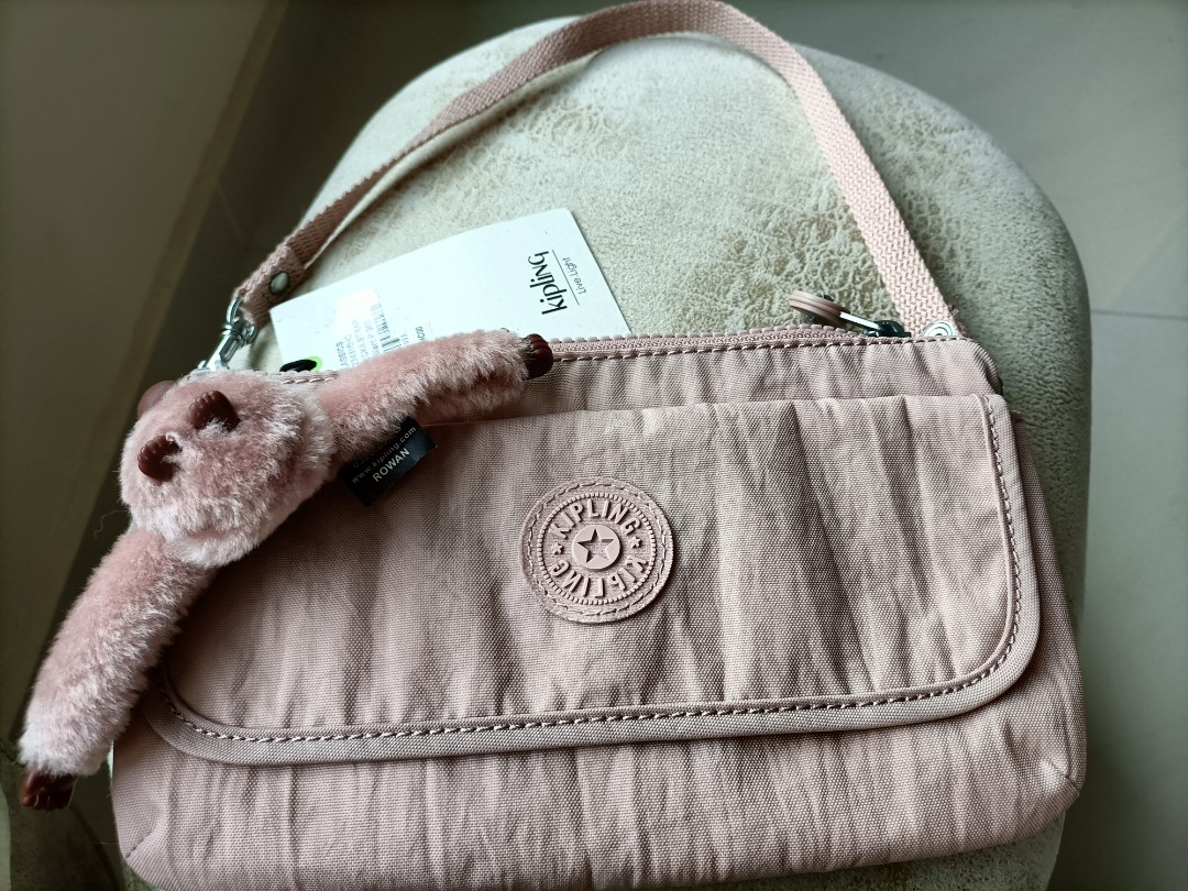 Kipling clutch bag hot sale