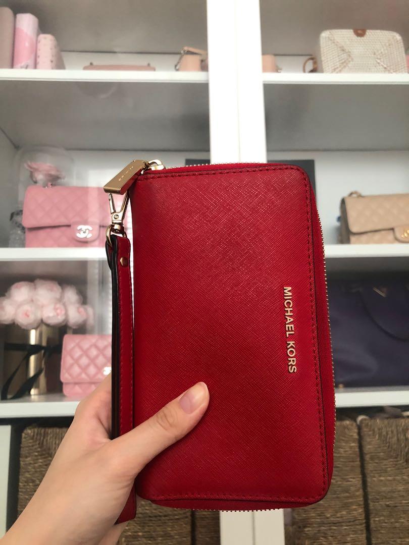 Michael Kors red long wallet /wristlet, Luxury, Bags & Wallets on Carousell
