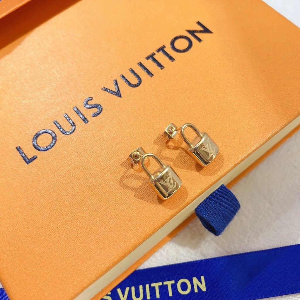 Louis Vuitton 14 k gold plated padlock earrings on hand, Women's