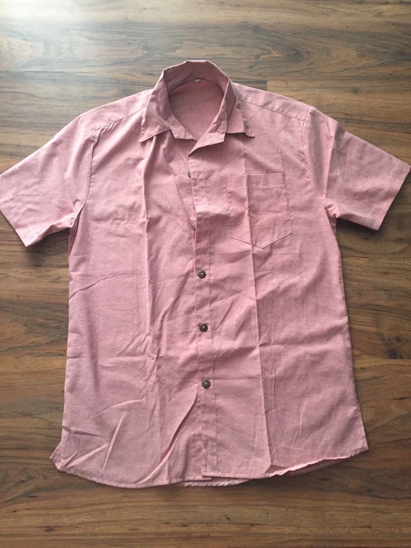 Red polo shirt with coconut buttons 