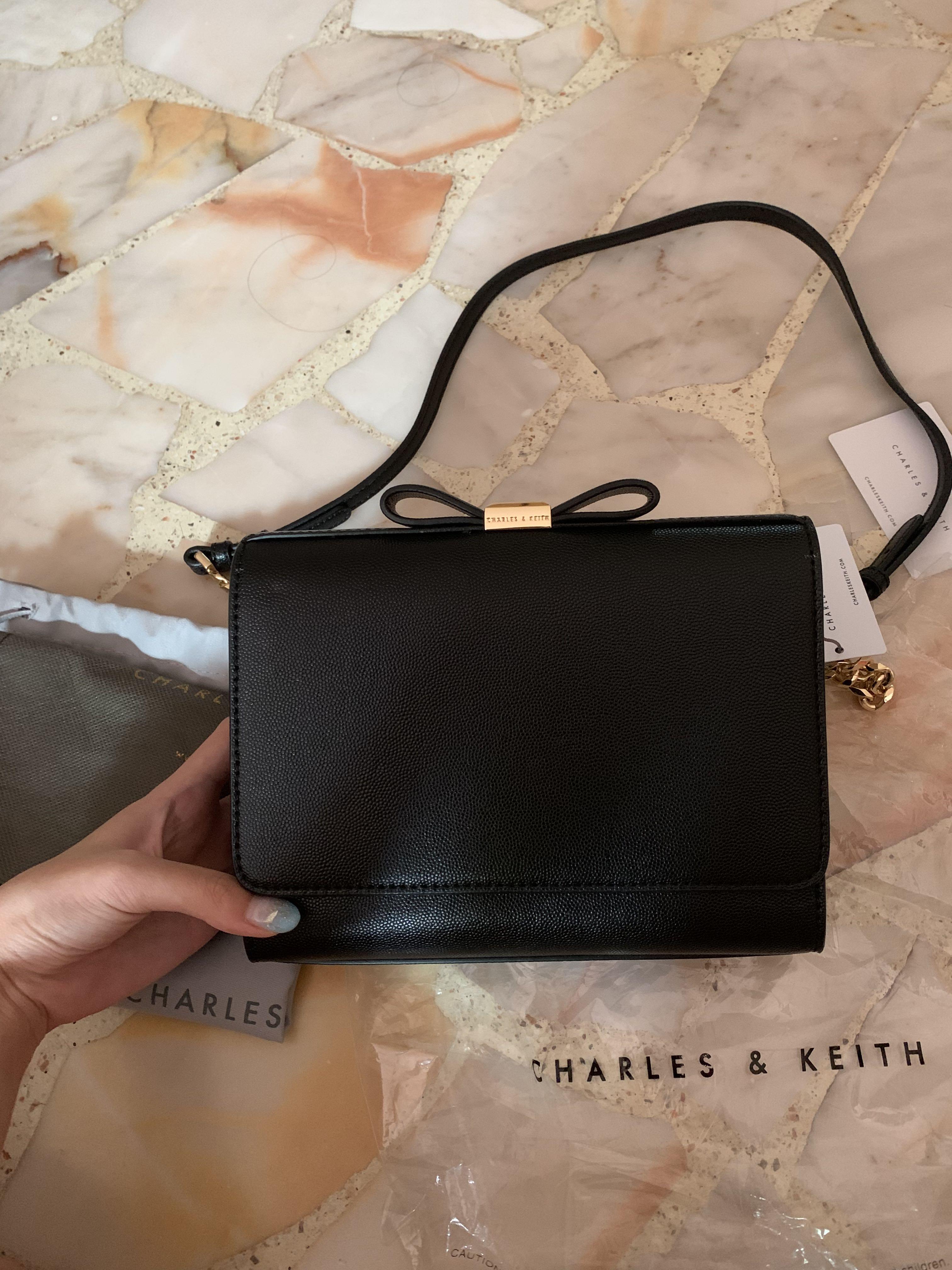 charles and keith bow detail clutch