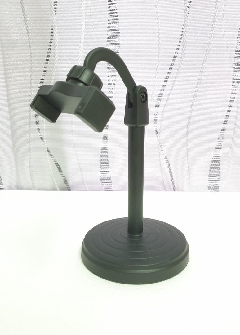 Handphone Stand with Multi- function Adjustable Angle (Category: Other Mobile & Gadget Accessories) located in Petaling Jaya. Submitted by luigines (Listing ID 1134389670, Image 2). Description: Brand New Product. Box is slightly Dented Adjustable Angle Maximum Height: 33cm Minimum Height: 23cm Metal Frame on the Base Base Thickness: 1.5cm Material: PVC Color: Black Packing List: 1* Mobile Phone Stand COD MCDONALD'S SUNWAY MENTARI @ BANDAR SUNWAY