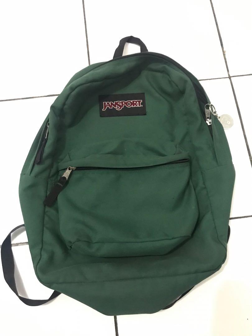 dark green jansport backpack