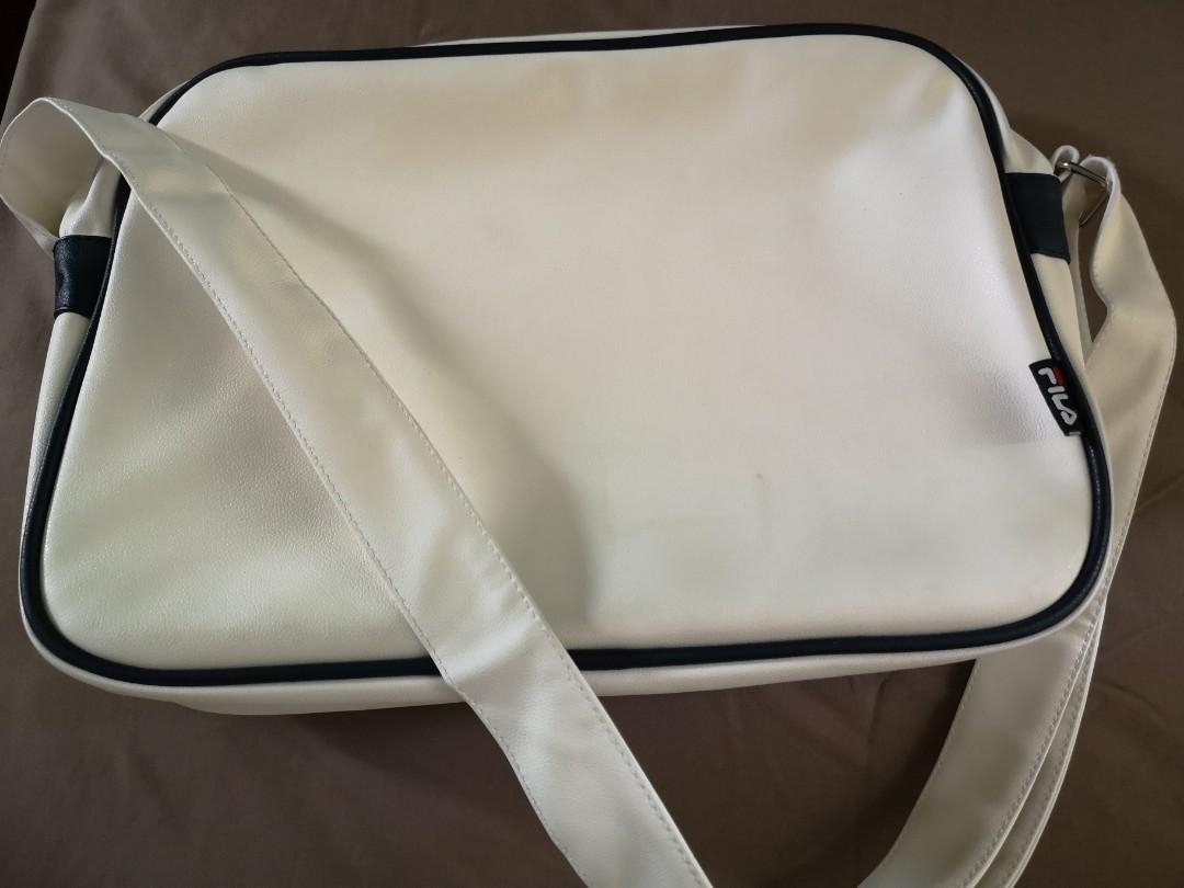 Original FILA bag (Category: Sling Bags) located in Mandaluyong City. Submitted by japs2 (Listing ID 1134370218, Image 3). Description: Original FILA sling bag Immaculate White with dust bag 11x14.5 inches 1200 negotiable Used only twice Mandaluyong area.