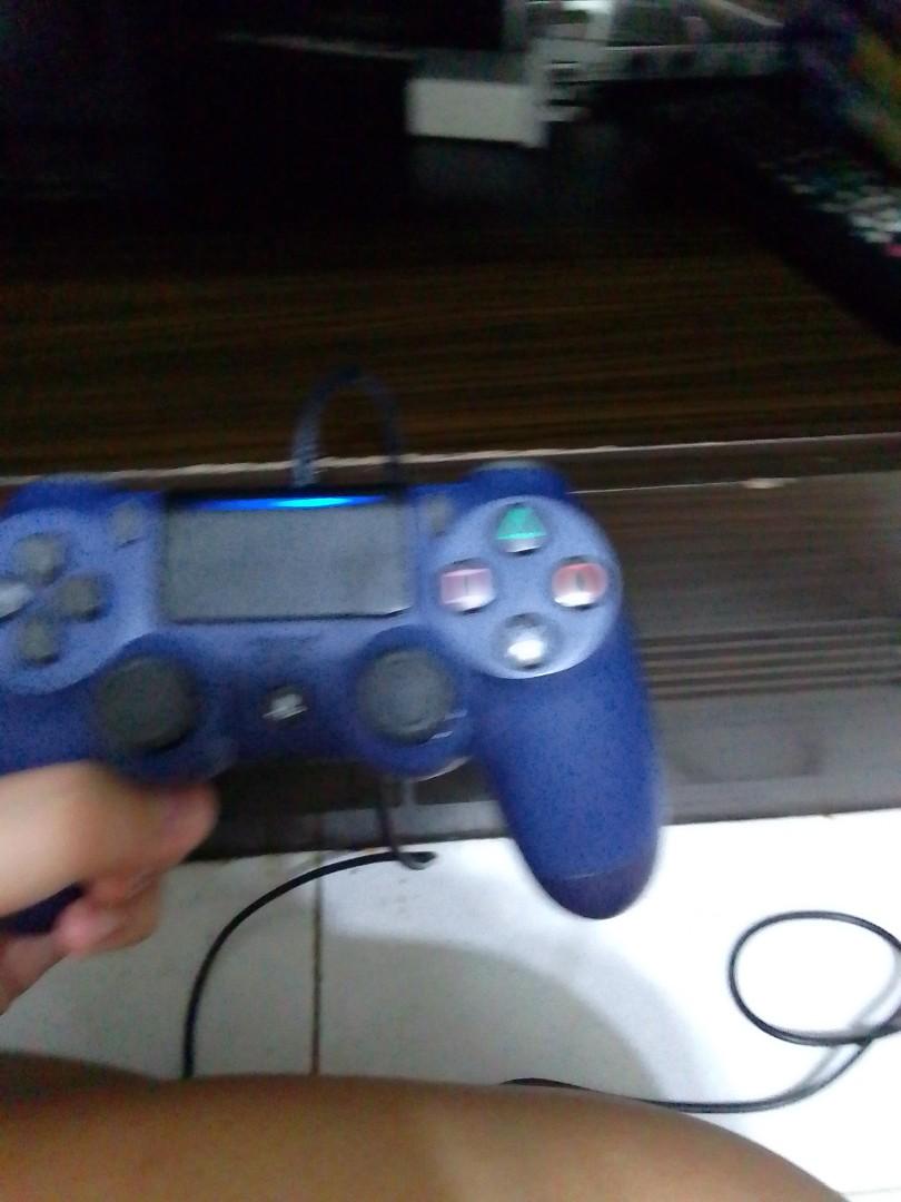 ps4 controller real (Category: Controllers) located in Singapore. Submitted by johnnykia (Listing ID 1134510499, Image 1). Description: new used for 2week quit gaming.