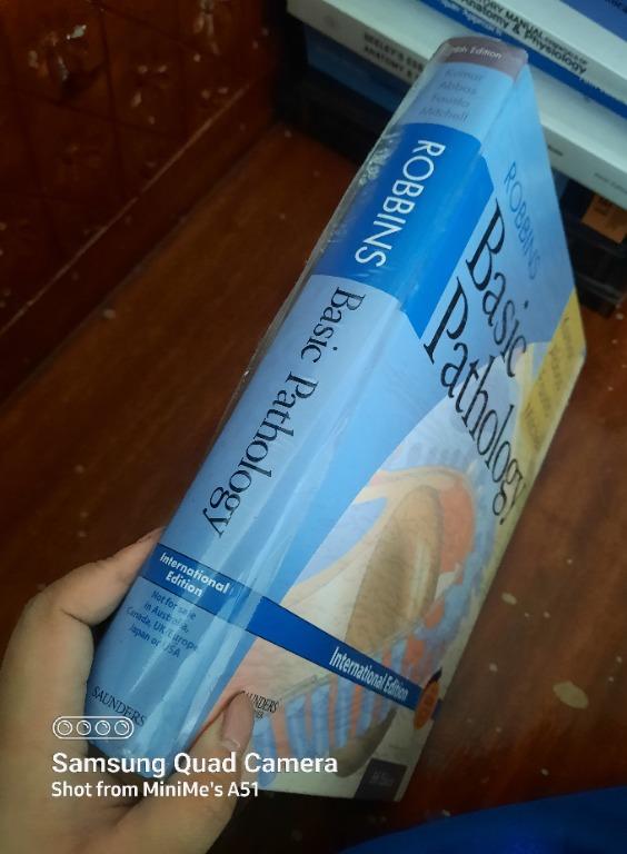 Robbins - Basic Pathology Book 8th Edition [Hard Bound] (Category: Textbooks) located in Malasiqui. Submitted by peachyminime (Listing ID 1134462006, Image 2). Description: Robbins - Basic Pathology Book 8th Edition [Hard Bound] - Preloved - Hard Bound (with minimal dents on outer plastic cover) - Original, bought from C&E Bookshop - Colored - With name on the first page (will be covered with white ink) - With name and initials on the bottom part