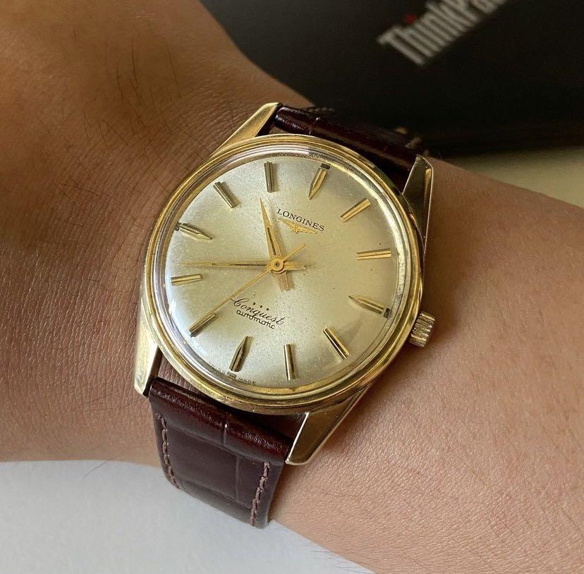 Longines conquest hotsell automatic gold