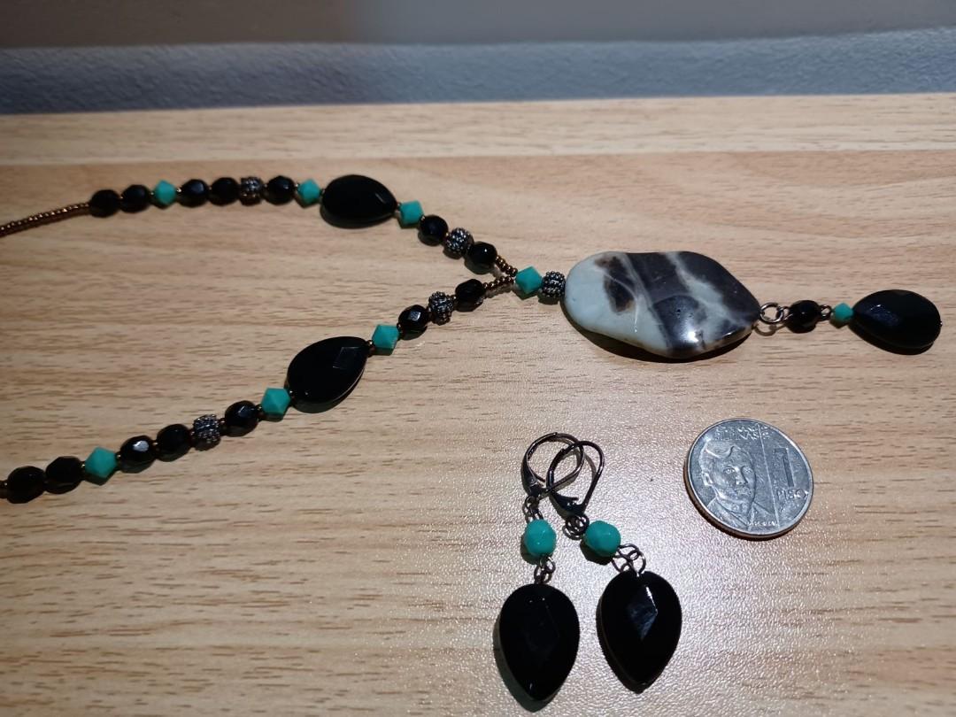 Y Drop Necklace Stone Matching Earrings (Category: Necklaces) located in Pasig City. Submitted by rokels_locker (Listing ID 1134404174, Image 2). Description: Elegant black and turquiose necklace, with black and white stone pendant. Matching earrings. Length: 16 inches, extendable to 18 inches Price is negotiable.