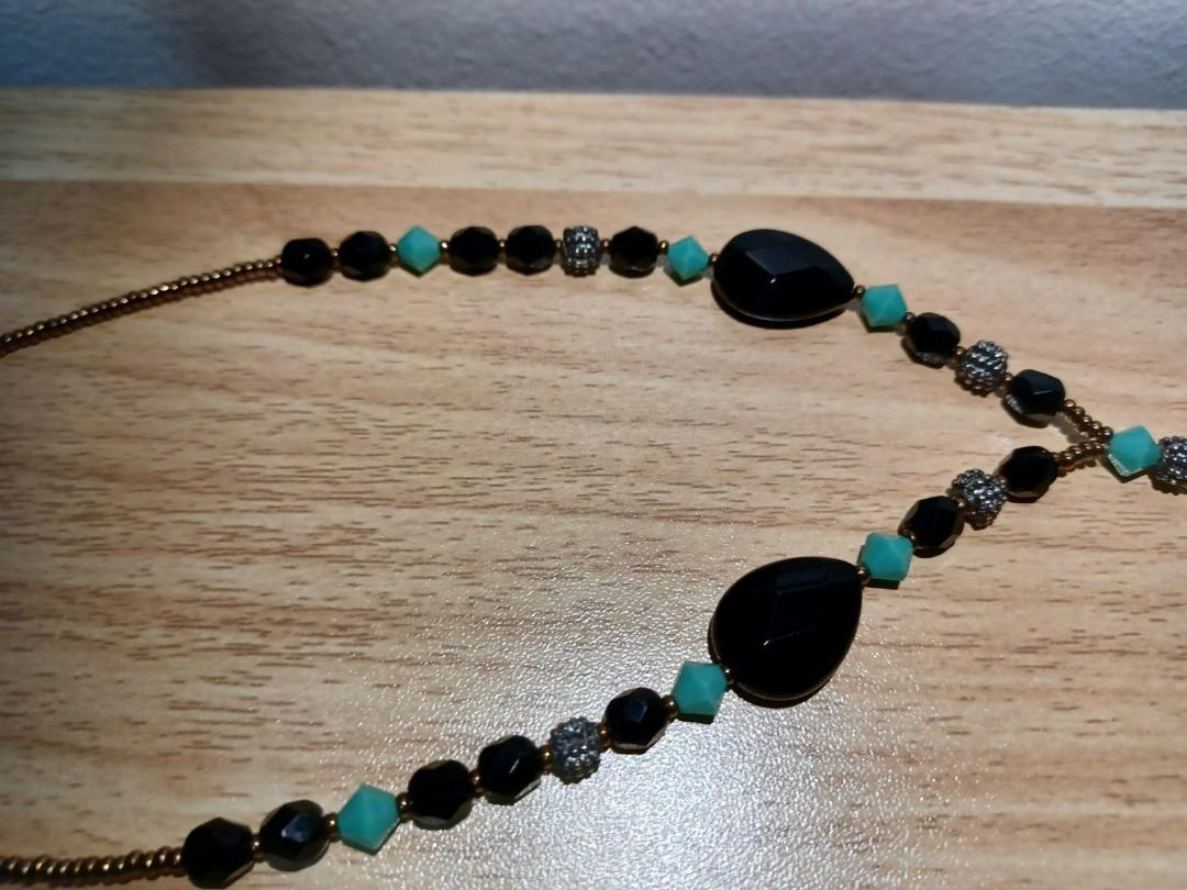 Y Drop Necklace Stone Matching Earrings (Category: Necklaces) located in Pasig City. Submitted by rokels_locker (Listing ID 1134404174, Image 3). Description: Elegant black and turquiose necklace, with black and white stone pendant. Matching earrings. Length: 16 inches, extendable to 18 inches Price is negotiable.