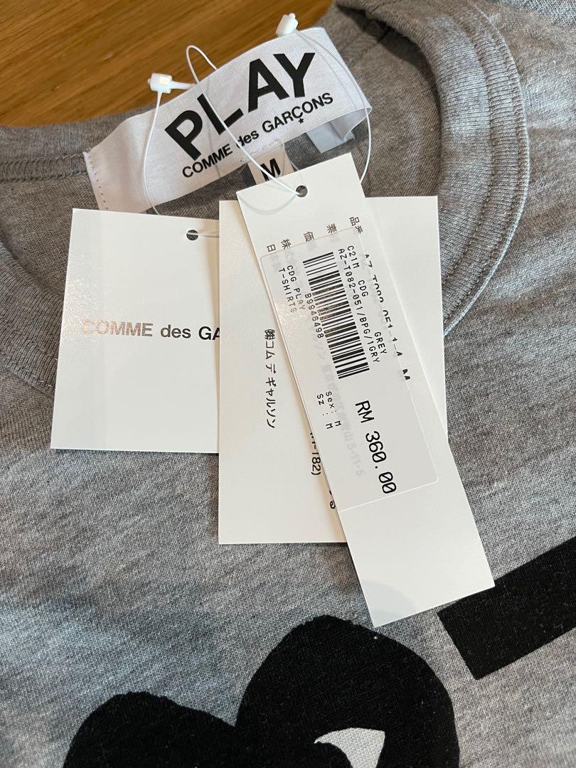 Comme des store garcons fake tag