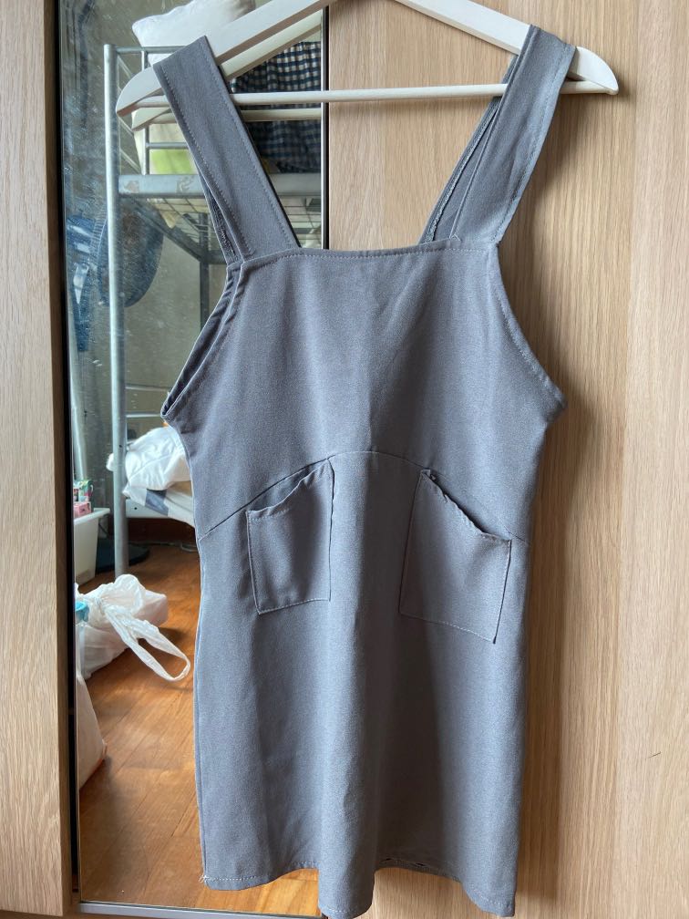 grey pinafore