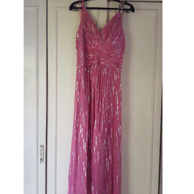 BCBG Pink Evening Gown with Silver Accents US 4 (Category: Evening dresses & gowns) located in Makati City. Submitted by nikkerbockers (Listing ID 1129501980, Image 3). Description: Beautiful BCBG formal dress with braided strap on one shoulder, and a silver chain on the other. Very unique and exquisite, just dry cleaned. Always received compliments in this dress. US 4, fits US small or Asian medium..