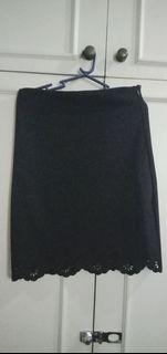 Black stretch skirt with floral details