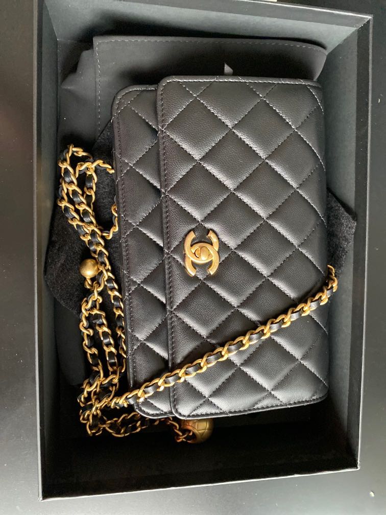 Chanel woc sales with gold ball