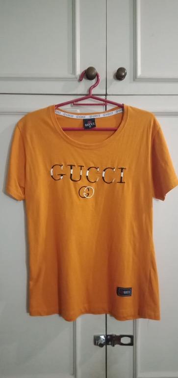 Guess yellow / mustard shirt (Category: Shirts) located in Manila. Submitted by mimi0023 (Listing ID 1129509590, Image 1). Description: used once.
