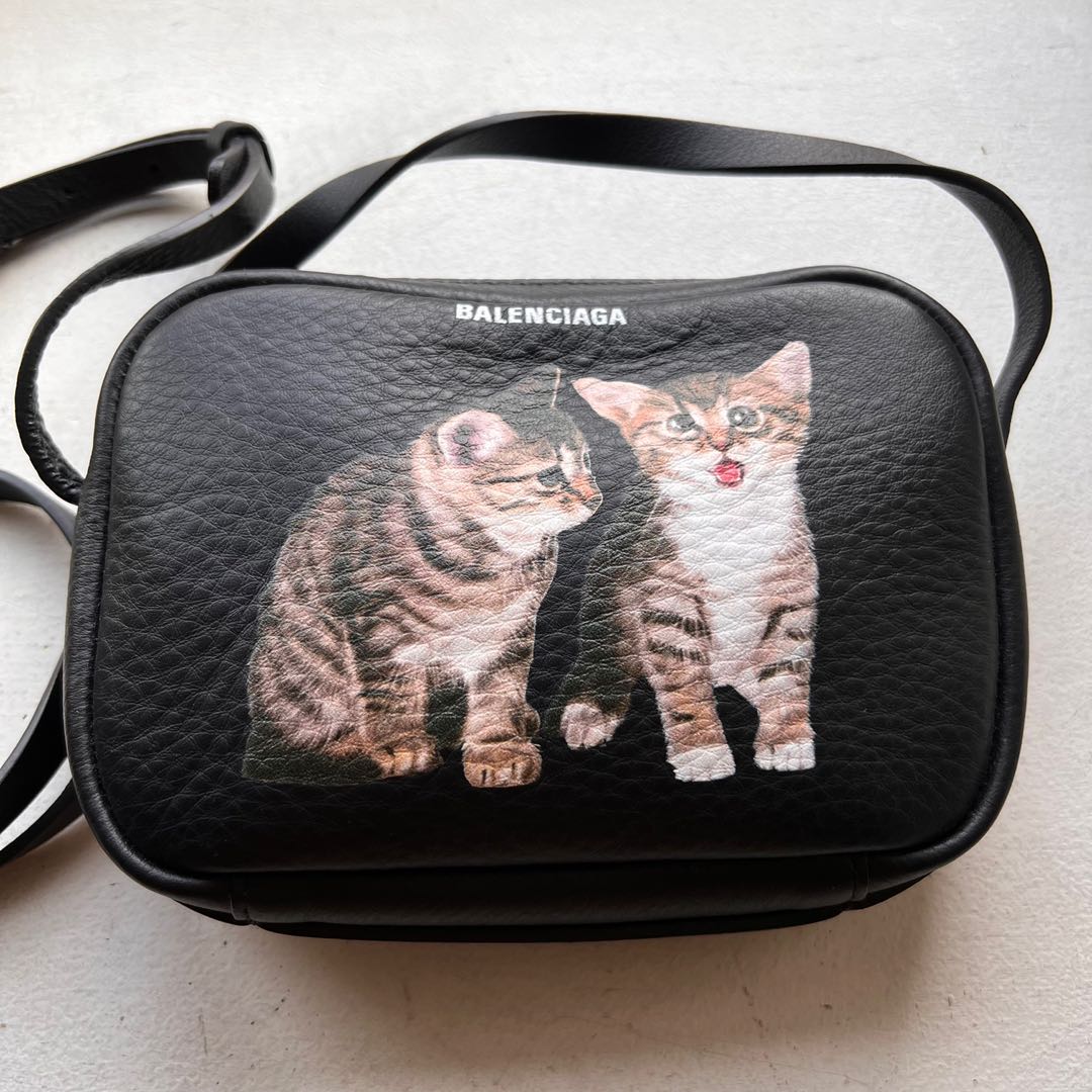 Balenciaga kittens sling bag, Luxury, Bags & Wallets on Carousell
