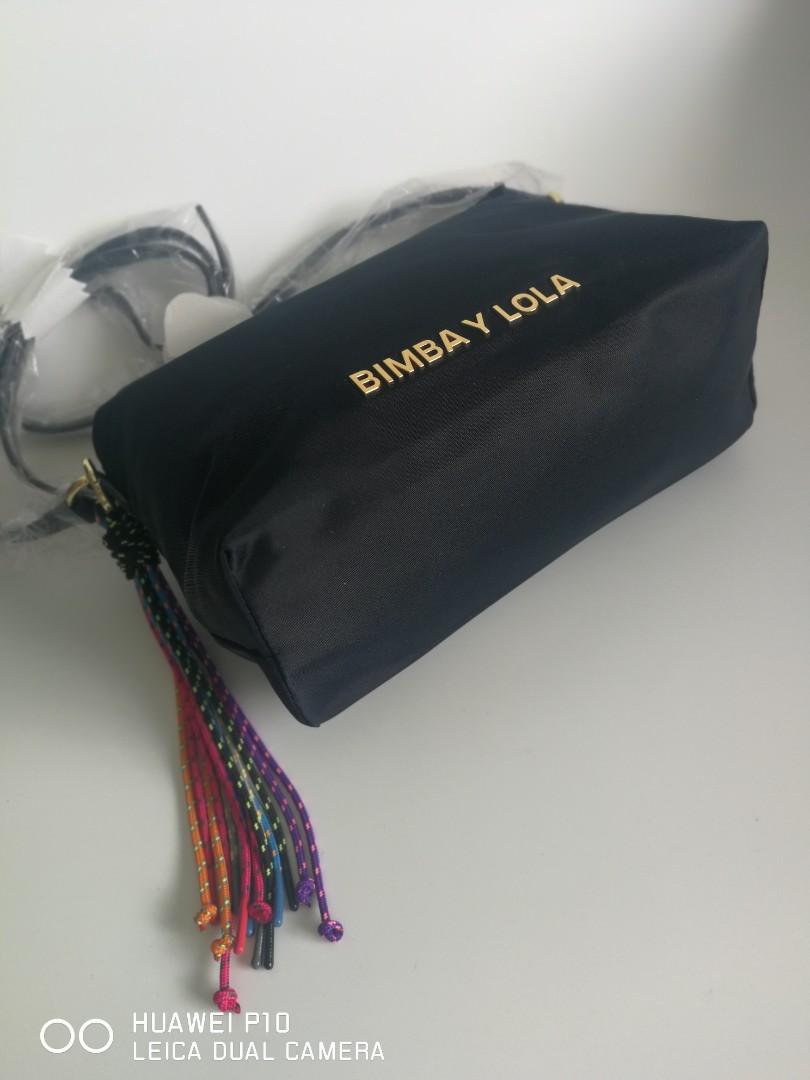 Bimba Y Lola cross body bag , dark navy with tassel, Women's Fashion, Bags  & Wallets, Cross-body Bags on Carousell