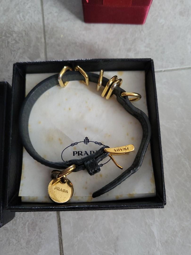 Prada leather charm bracelet | Leather charm bracelets, Womens jewelry  bracelets, Bracelet shops