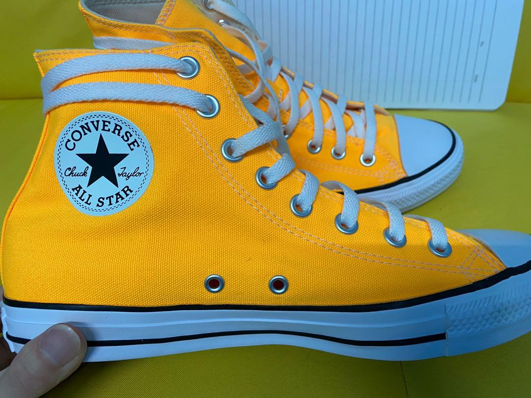Bright orange hotsell converse