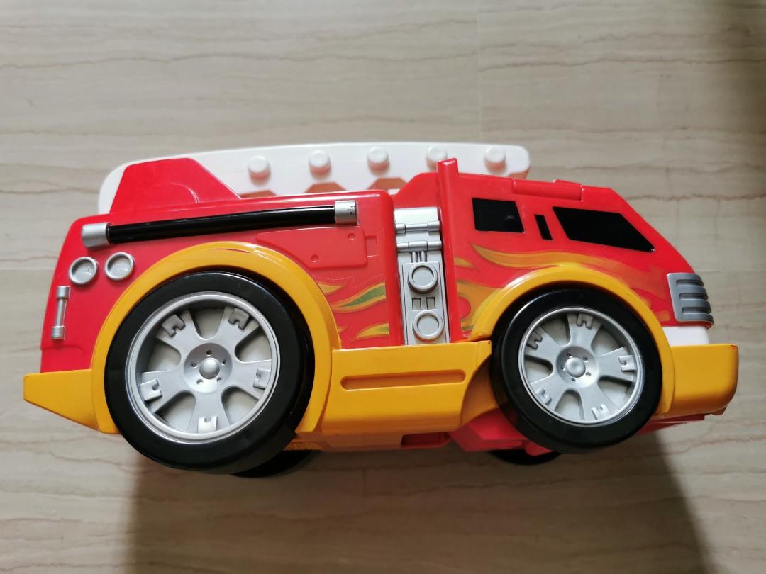 Fire engine car transformable (Category: Infant Playtime) located in Singapore. Submitted by alibaba007 (Listing ID 1129933895, Image 1). Description: Big size.