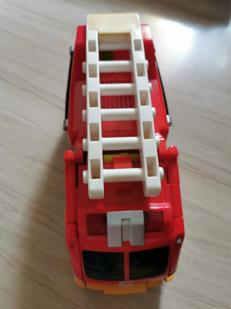Fire engine car transformable (Category: Infant Playtime) located in Singapore. Submitted by alibaba007 (Listing ID 1129933895, Image 3). Description: Big size.