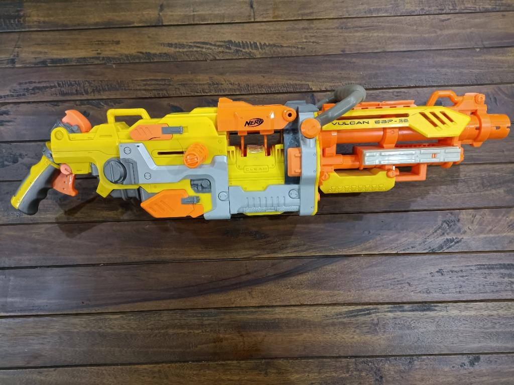 Nerf Vulcan (Category: Action & Battle Toys) located in Singapore. Submitted by primemaster07 (Listing ID 1129872621, Image 6). Description: Nerf Vulcan Been stored and not frequently used but still works wonders! Every stock part and component is included, ammo can, dart belt, tripod, carry handle and the main blaster Payment Terms: Cash (Self Collect) Bank Transfer Shipping: Self-collect @ Woodlands By post is an additional cost. On received pa
