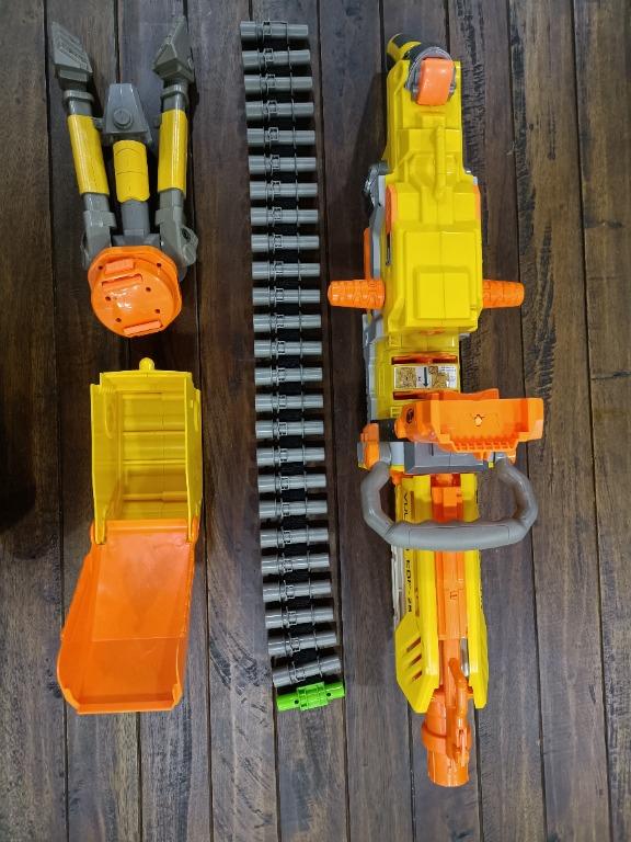 Nerf Vulcan (Category: Action & Battle Toys) located in Singapore. Submitted by primemaster07 (Listing ID 1129872621, Image 7). Description: Nerf Vulcan Been stored and not frequently used but still works wonders! Every stock part and component is included, ammo can, dart belt, tripod, carry handle and the main blaster Payment Terms: Cash (Self Collect) Bank Transfer Shipping: Self-collect @ Woodlands By post is an additional cost. On received pa