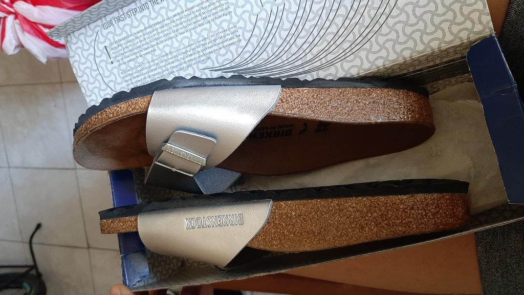 Authentic Birkenstock Madrid Silver (Category: Flats & Sandals) located in Malabon City. Submitted by eebt1113 (Listing ID 1130082149, Image 2). Description: - Authentic Birkenstock Sandals (Madrid) - Silver leather strap - It comes with a box - No flaws at all - Stocked in my closet only RFS: Wrong size, price still negotiable.