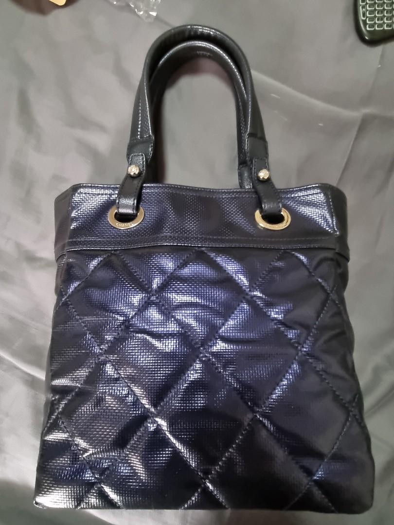 Chanel biarritz (Category: Luxury Bags & Wallets) located in Makati City. Submitted by snapitupgoods (Listing ID 1130086767, Image 2). Description: Chanel Silver Paris Biarritz Tote Bag is part of Chanel's Paris Biarritz Travel Collection. The exterior features canvas with diamond quilted water-resistant coated canvas body and leather trim. The exterior coated canvas is clean and beautiful throughout with some light rubbing to the bottom corners.