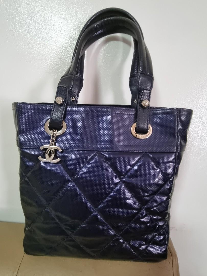 Chanel biarritz (Category: Luxury Bags & Wallets) located in Makati City. Submitted by snapitupgoods (Listing ID 1130086767, Image 1). Description: Chanel Silver Paris Biarritz Tote Bag is part of Chanel's Paris Biarritz Travel Collection. The exterior features canvas with diamond quilted water-resistant coated canvas body and leather trim. The exterior coated canvas is clean and beautiful throughout with some light rubbing to the bottom corners.