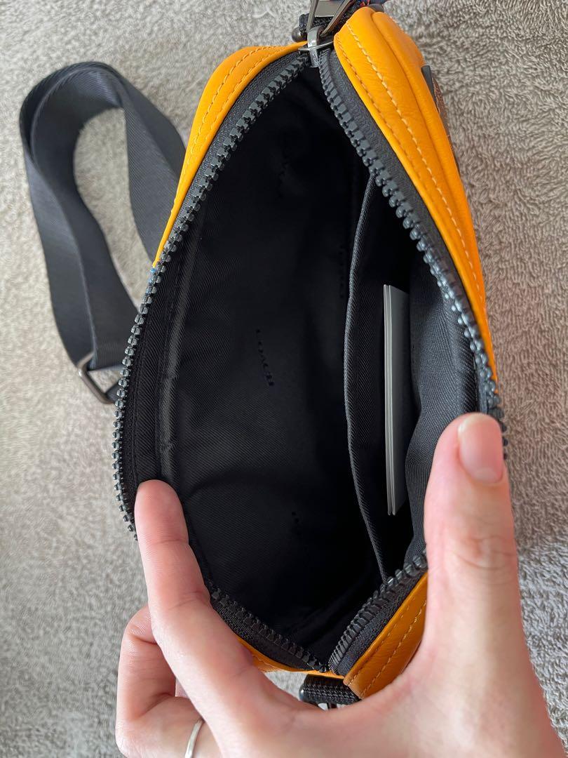 Coach pacer slim pouch deals