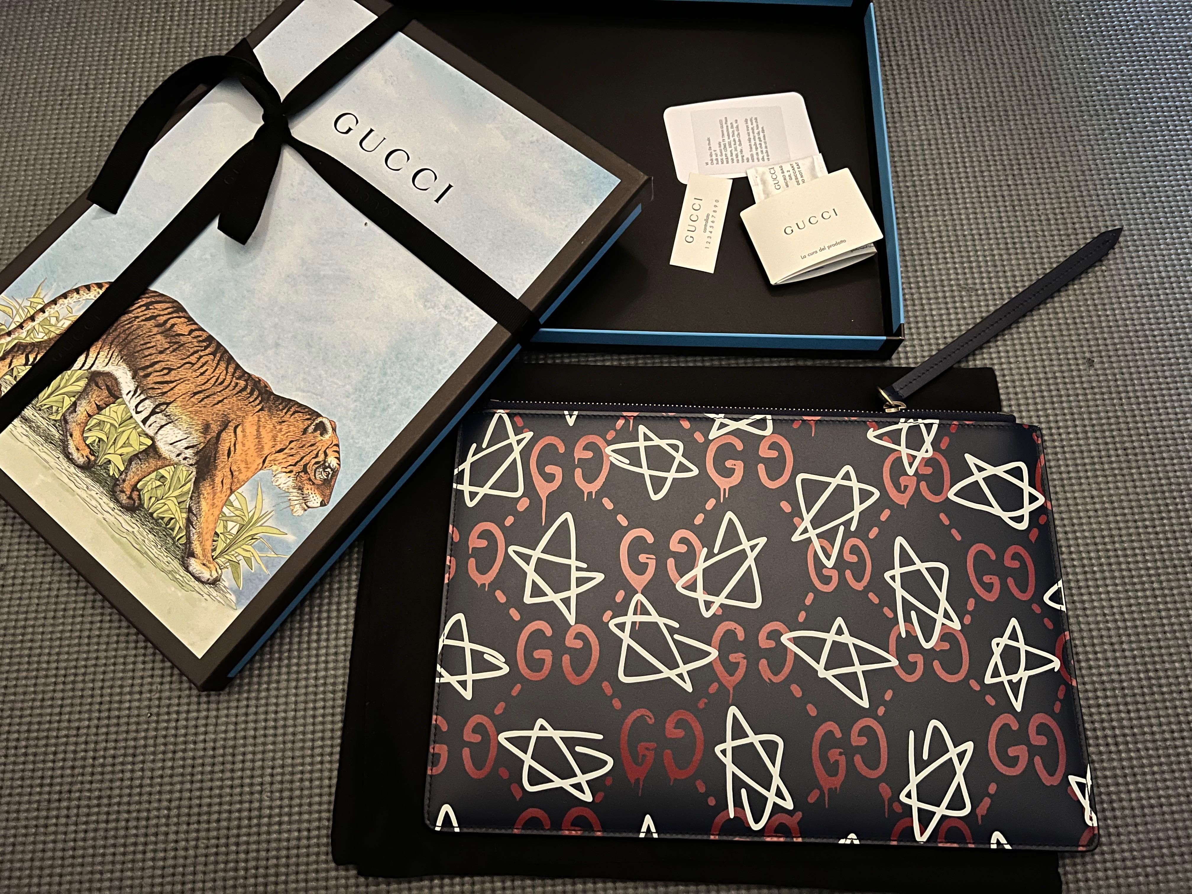 Gucci ghost clutch discount